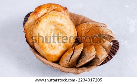 Sliced tandir bread isolated top view Royalty-Free Stock Photo #2234017205