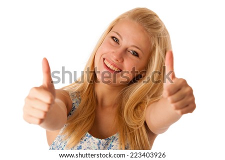 Young business woman with blonde hair and blue eyes gesturing success showing thumb up isolated over white