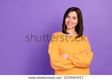 Close up photo of cute sweet lady wear orange sweater show bright toothy smile good mood empty space isolated on purple color background