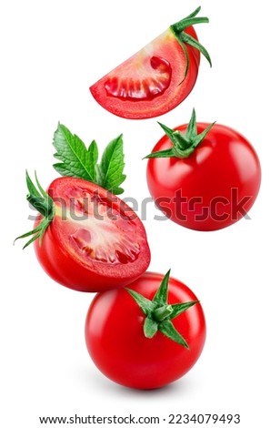Tomato isolated. Whole tomato with leaf flying on white background. Falling tomato, half, slice and leaves side view composition. Full depth of field. Royalty-Free Stock Photo #2234079493