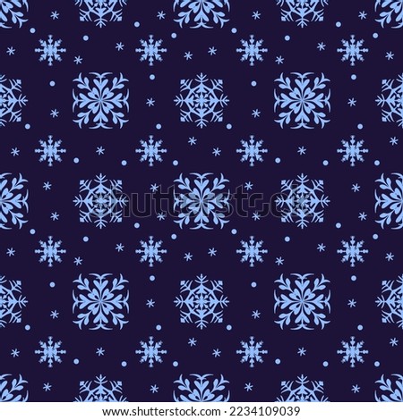 Falling snowflakes on blue background, seamless pattern snowflake.