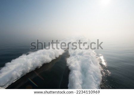 Wake of a fast ferry on calm sea. Royalty-Free Stock Photo #2234110969