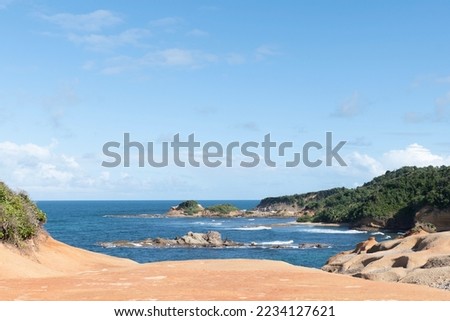 Red Rocks at Pointe Baptiste in Calibishie, Caribbean Island of Dominica Royalty-Free Stock Photo #2234127621