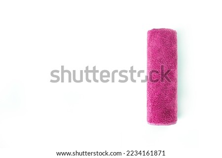 Top view , Red towel roll isolated on white background.