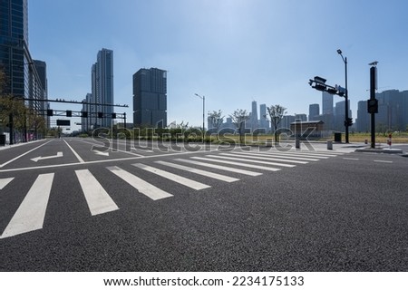 empty asphalt road in city