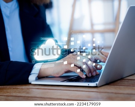 Cloud storage technology concept. Glow cloud tech icon and transfer management digital files and folders on a virtual laptop computer screen. Online Document collaboration and sharing software system. Royalty-Free Stock Photo #2234179059