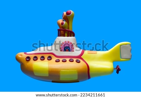 Yellow Submarine isolated on blue sea background Royalty-Free Stock Photo #2234211661