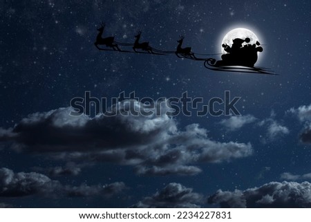 Santa Claus flies on Christmas Eve in the night sky with snow