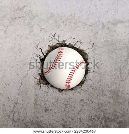 Baseball ball flying through the wall with cracks
