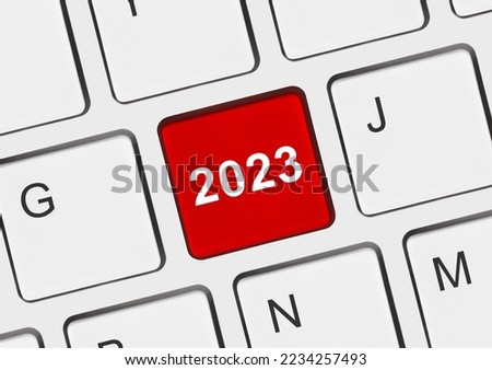 Computer keyboard with 2023 key - holiday concept
