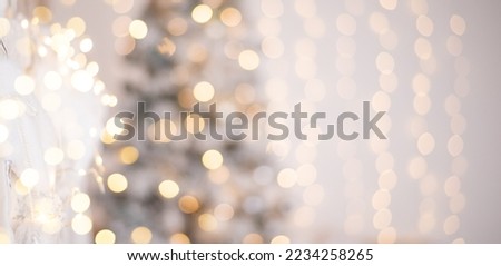 New Year background with selective focus and space for text. Silver and golden color of jewelry. Brilliant lights