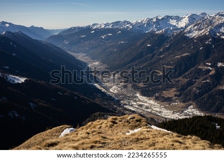 Pinzolo in winter sunny day. Val Rendena dolomites  Italian alps, Trentino Italy.