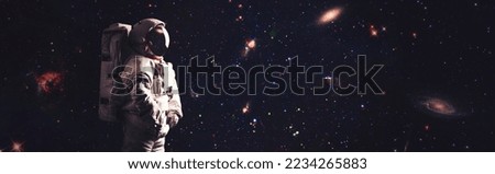 Astronaut in outer space , Cosmic art, science fiction wallpaper. Beauty of deep space. Elements of this image furnished by NASA