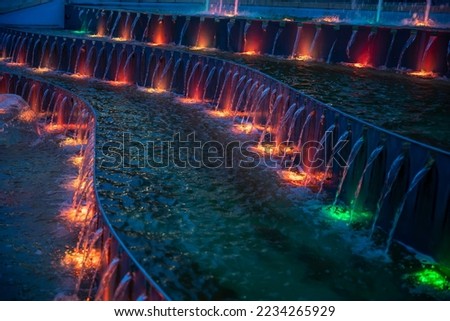 Colorful illuminated waterworks at evening
 Royalty-Free Stock Photo #2234265929