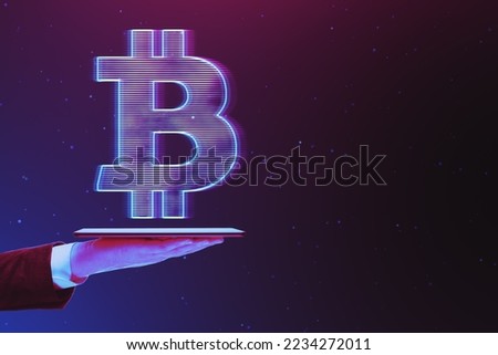 Close up of businessman hand holding smartphone with glowing digital bitcoin hologram on dark purple background with mock up place. Cryptocurrency and finance concept