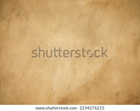 Old brown vintage paper texture. Grunge background. 50s style Royalty-Free Stock Photo #2234276215