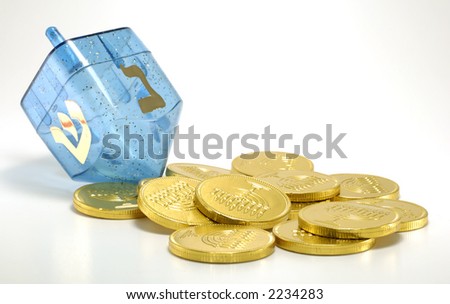 Photo of a Dreidel and Gelt (Candy Coins) - Chanukah Related Objects
