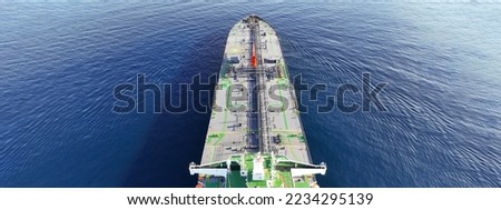 Aerial drone ultra wide panoramic photo of latest technology industrial crude oil - fuel tanker ship cruising deep blue Mediterranean sea
