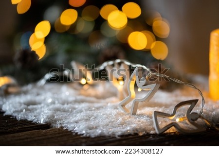 christmas string lights in snow