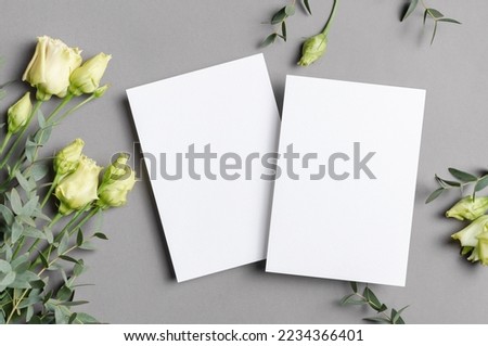 Iinvitation card mockup with flowers, front and back sides, blank cards with copy space