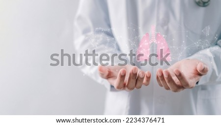 doctor hands holding lungs organ , world tuberculosis day, world no tobacco day, lung cancer, Pulmonary hypertension, copd, eco air pollution,  pneumonia, donation, respiratory and chest concept Royalty-Free Stock Photo #2234376471