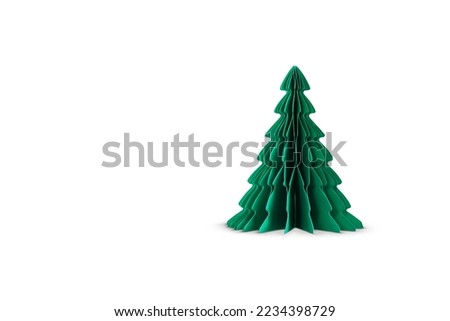 Christmas tree made of paper isolated on white background.