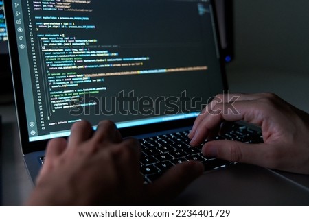 developer coding in laptop. Programming software concept Royalty-Free Stock Photo #2234401729