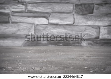 Wood table top and background of old brick wall - can used for display or montage your products