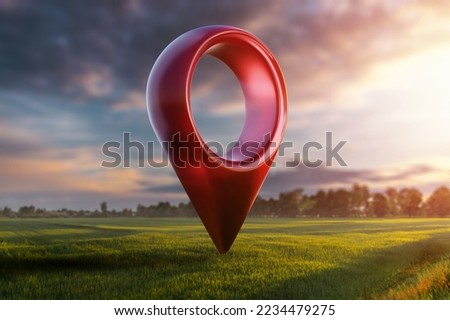 Green field and sunset with destination big red pin location. Concept of goal, dream, end, picnic, victory. mixed media Royalty-Free Stock Photo #2234479275