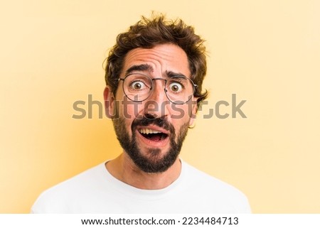 young crazy expressive man sad or worried Royalty-Free Stock Photo #2234484713