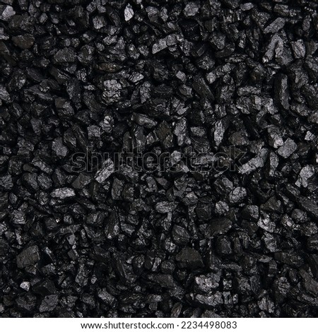 Fuel for furnace heating - hard coal. Pile of natural black hard coal for texture background. Best grade of metallurgical anthracite coals often referred to as stone coal and black diamond coal Royalty-Free Stock Photo #2234498083