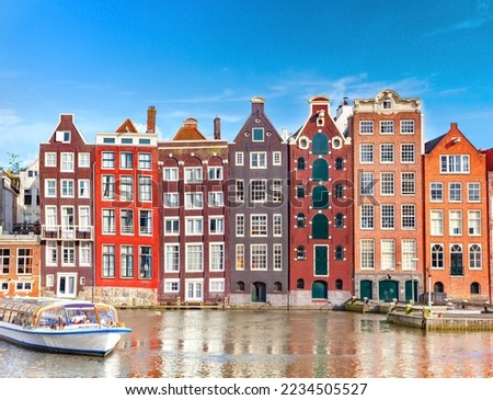 Typical dutch houses in Amsterdam, Netherlands Royalty-Free Stock Photo #2234505527