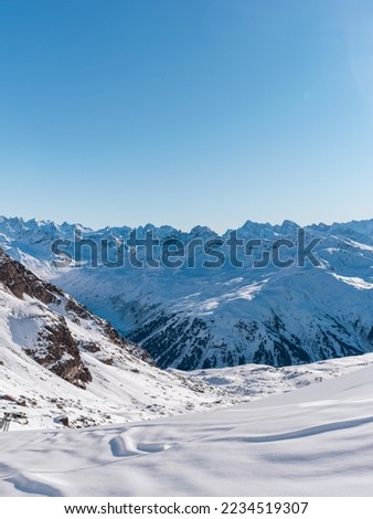 Long views over beautiful snowy mountains in the winter
