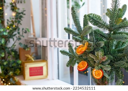 Dried oranges on  the christmas tree in vase