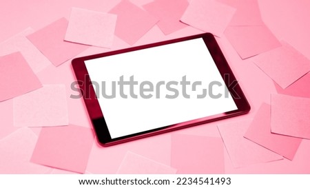 Viva Meganta toned red magenta mock up image black tablet pc white blank screen. Colorful memo sticky pin clips empty notes. Trendy color of the year 2023. Fashion color pattern
