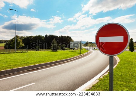 road with road sign prohibiting