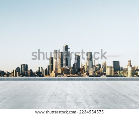 Empty concrete dirty rooftop on the background of a beautiful New York city skyline at morning, mockup