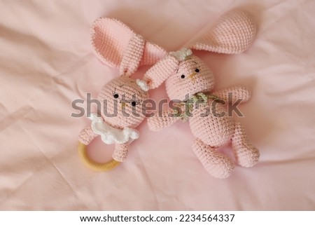 handmade pink bunny on a pink background