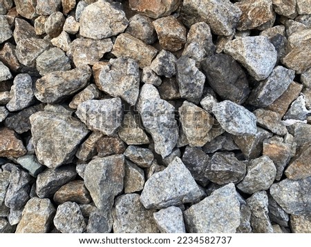 Many railroad laying stones have a soft color Many stones are suitable for background images and illustrations Close-up rocks
