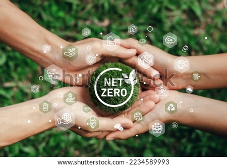 net zero and carbon neutral concept By working together with the goal of net zero emissions. Long-term, climate-neutral strategy Royalty-Free Stock Photo #2234589993