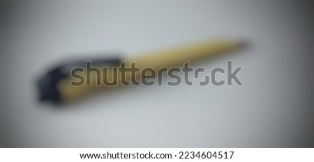 defocused abstract background of paper cutting knife
