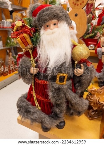 Santa Claus statue decoration for sell in Christmas market in Massachusetts MA, USA. 