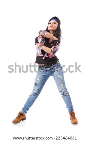 Modern hip-hop dance girl pose on isolated background. Break dance go-go girl standing on white
