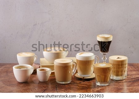 Various hot beverages on coffee basis Royalty-Free Stock Photo #2234663903