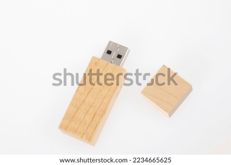 wooden USB flash key cap disk memory stick in white background