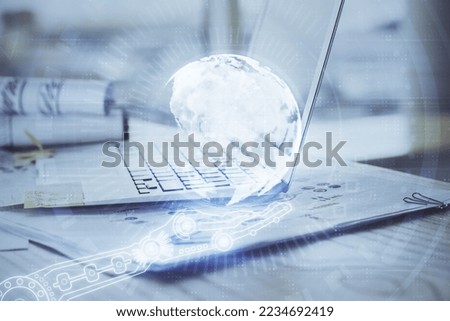 Multi exposure of table with computer and world map hologram. International data network concept.