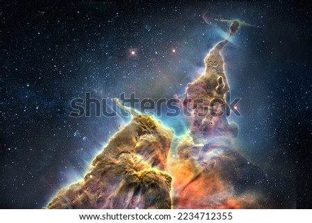 The Carina Nebula's 'Mystic Mountain' and starry night sky. Panoramic view on Galaxy and stars, view from space. Elements of this image furnished by NASA.