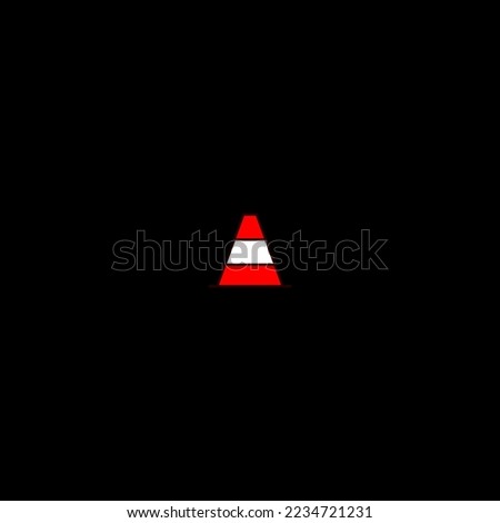 Traffic cone on black background