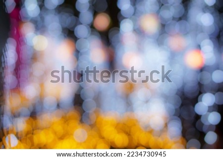 Blurred and bokeh of Christmas holiday lightings pattern background