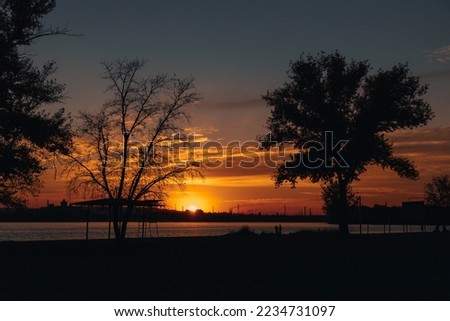 Beautiful sunset or dawn sky over the city. Dnipro.Ukraine. Background picture. Dramatic evening cloudy landscape in the city.Ukrainian city. View of the left bank. River Dnepr